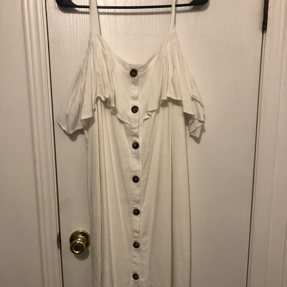 White dress with cold shoulder loop.